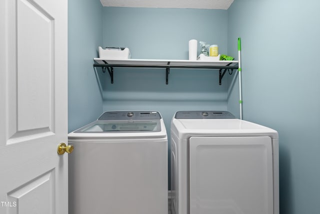 202 Stonecreek Dr, Apex, NC 27539 - laundry area with washing machine and clothes dryer