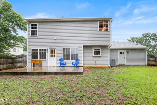 202 Stonecreek Dr, Apex, NC 27539 - rear view of property featuring central air condition unit and a patio