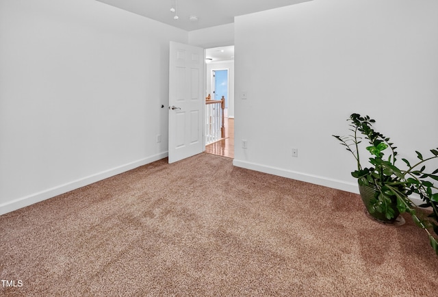1437 Lindenberg Sq, Wake Forest, NC 27587 - carpeted empty room featuring baseboards and a smoke detector
