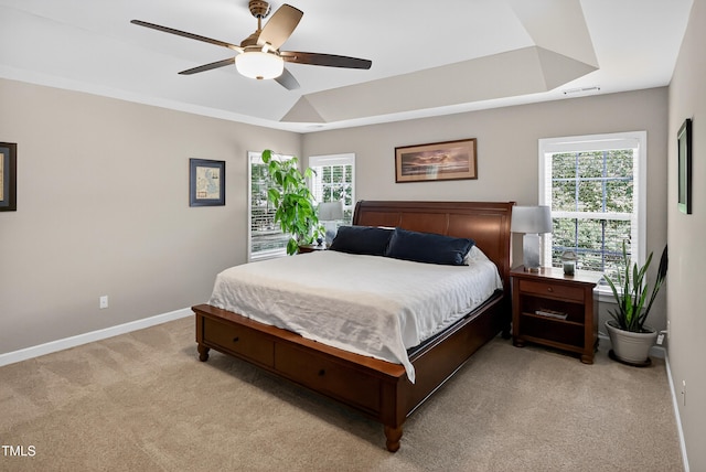1437 Lindenberg Sq, Wake Forest, NC 27587 - bedroom featuring light carpet, ceiling fan, and a tray ceiling