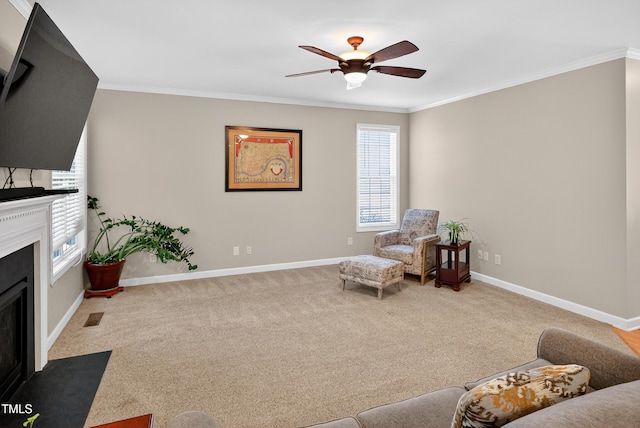 1437 Lindenberg Sq, Wake Forest, NC 27587 - sitting room with a fireplace with flush hearth, a ceiling fan, ornamental molding, and carpet floors