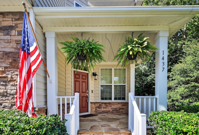 1437 Lindenberg Sq, Wake Forest, NC 27587 - doorway to property featuring a porch
