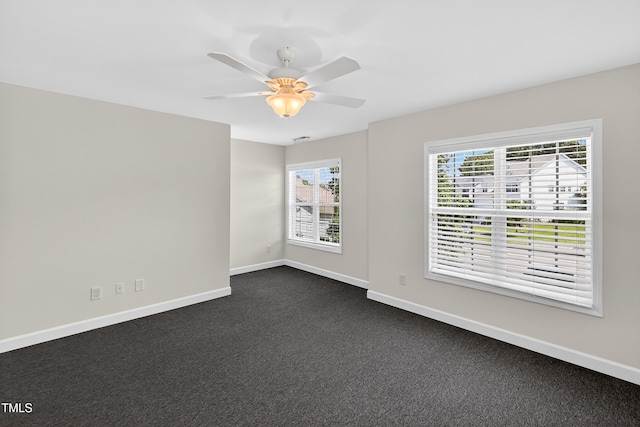 1437 Lindenberg Sq, Wake Forest, NC 27587 - unfurnished room with a ceiling fan and dark colored carpet