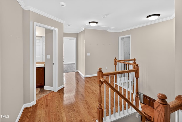 1437 Lindenberg Sq, Wake Forest, NC 27587 - hall with an upstairs landing, light wood-style floors, and crown molding