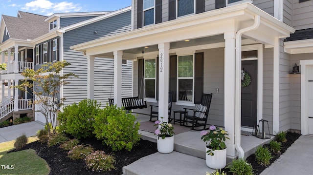 2012 Sweet Samson St, Wake Forest, NC 27587 - view of exterior entry with covered porch and a shingled roof