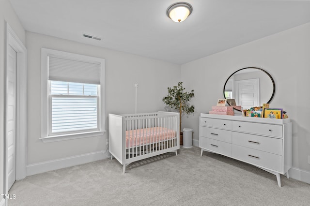 2012 Sweet Samson St, Wake Forest, NC 27587 - bedroom featuring light carpet, a crib, and baseboards