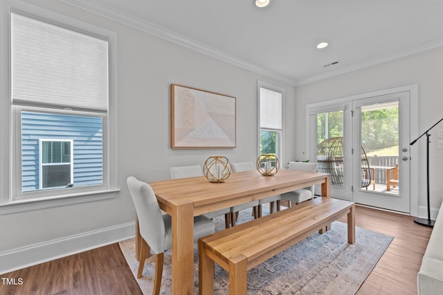 2012 Sweet Samson St, Wake Forest, NC 27587 - dining room featuring wood finished floors, crown molding, recessed lighting, and baseboards