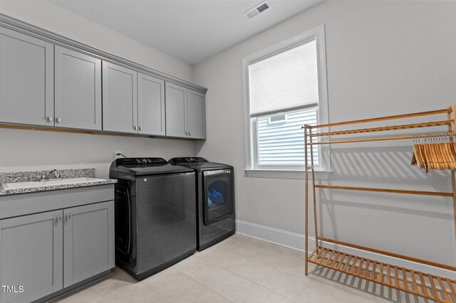2012 Sweet Samson St, Wake Forest, NC 27587 - washroom featuring independent washer and dryer, cabinet space, and baseboards