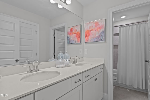 2012 Sweet Samson St, Wake Forest, NC 27587 - bathroom with double vanity, tile patterned flooring, toilet, and shower / bath combo with shower curtain