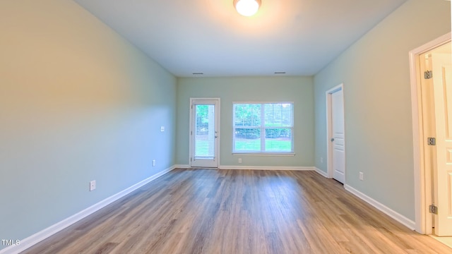 151 Braeside Ct, Cary, NC 27519 - unfurnished room featuring wood finished floors and baseboards