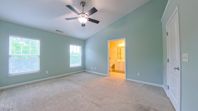 151 Braeside Ct, Cary, NC 27519 - unfurnished bedroom with light carpet, baseboards, connected bathroom, ceiling fan, and high vaulted ceiling