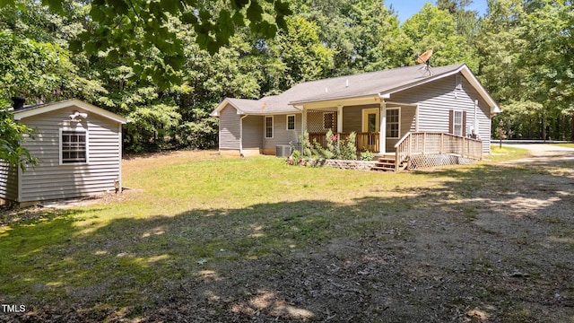 428 Long Branch Dr, Lacrosse, VA 23950 - back of house featuring cooling unit, a yard, a porch, and an outdoor structure