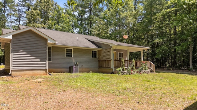 428 Long Branch Dr, Lacrosse, VA 23950 - back of house featuring a lawn, central AC, and roof with shingles