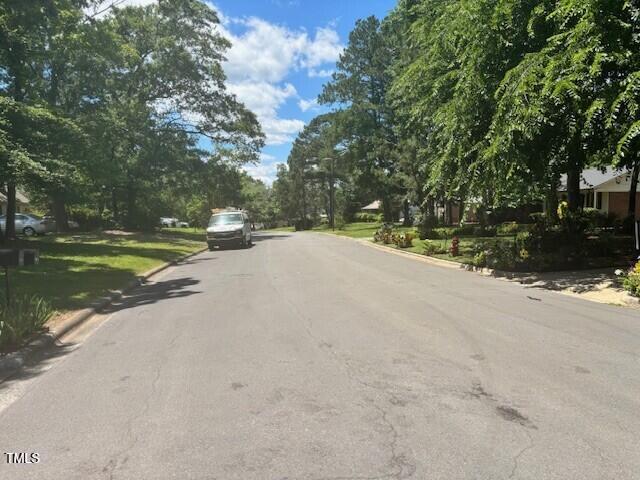 708 Old Barn Ave, Durham, NC 27704 - view of asphalt road featuring curbs