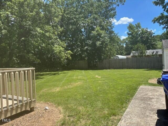 708 Old Barn Ave, Durham, NC 27704 - view of yard featuring a wooden deck