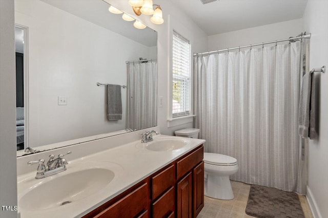 4605 All Points View Way, Raleigh, NC 27614 - bathroom featuring toilet and double vanity