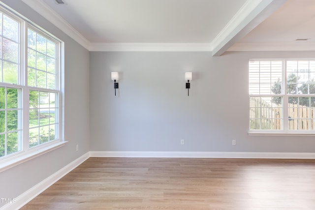 12320 Tetons Ct, Durham, NC 27703 - unfurnished room featuring crown molding and light wood-type flooring