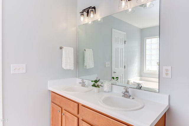 12320 Tetons Ct, Durham, NC 27703 - bathroom with double vanity and a tub to relax in