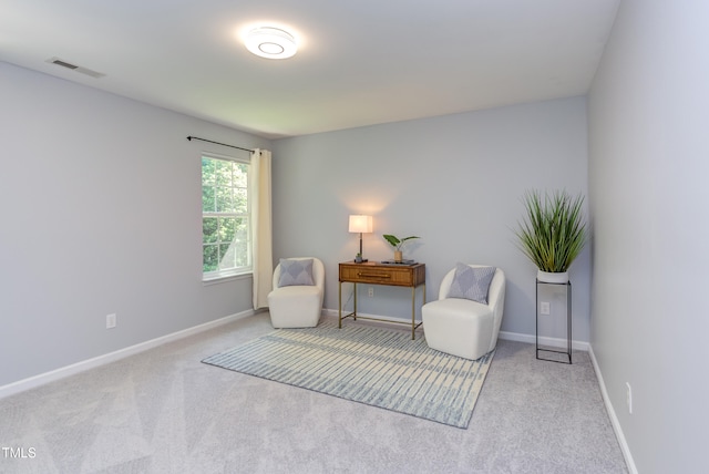 12320 Tetons Ct, Durham, NC 27703 - living area with carpet flooring