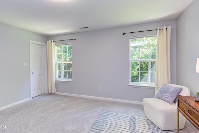 12320 Tetons Ct, Durham, NC 27703 - sitting room featuring light colored carpet and baseboards