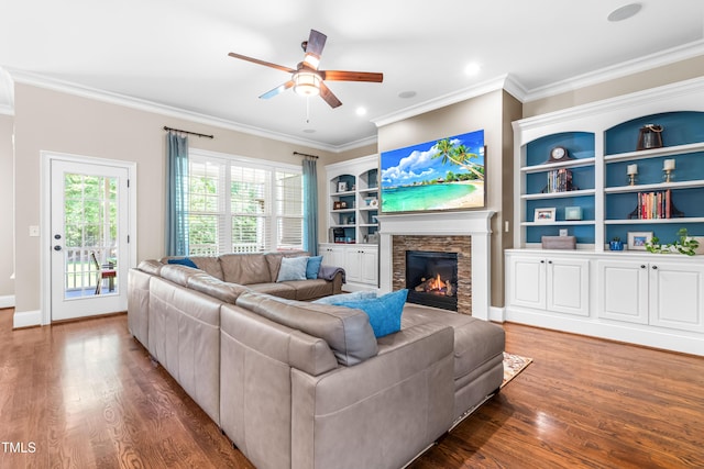 2538 Tuffeto, Apex, NC 27502 - living area featuring ceiling fan, wood finished floors, a fireplace, crown molding, and recessed lighting