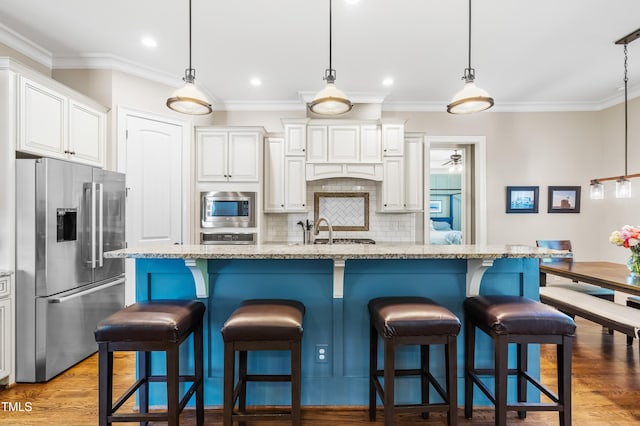 2538 Tuffeto, Apex, NC 27502 - kitchen featuring stainless steel appliances, tasteful backsplash, crown molding, a breakfast bar area, and light stone countertops
