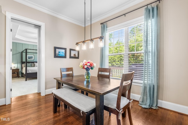 2538 Tuffeto, Apex, NC 27502 - dining area with baseboards, crown molding, and wood finished floors
