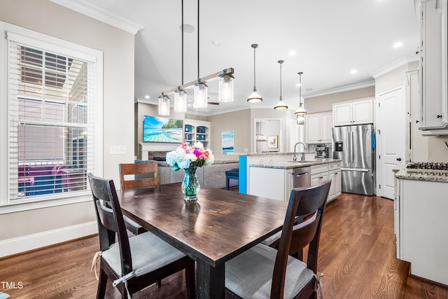 2538 Tuffeto, Apex, NC 27502 - dining room with ornamental molding, dark wood-style floors, plenty of natural light, recessed lighting, and baseboards