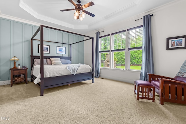 2538 Tuffeto, Apex, NC 27502 - bedroom with crown molding, carpet flooring, a tray ceiling, and a ceiling fan