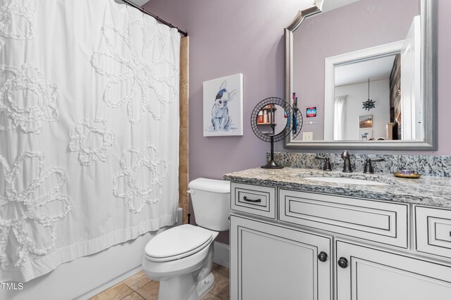 2538 Tuffeto, Apex, NC 27502 - full bathroom featuring toilet, vanity, shower / tub combo with curtain, and tile patterned flooring