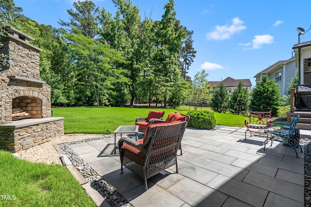 2538 Tuffeto, Apex, NC 27502 - view of patio with an outdoor stone fireplace