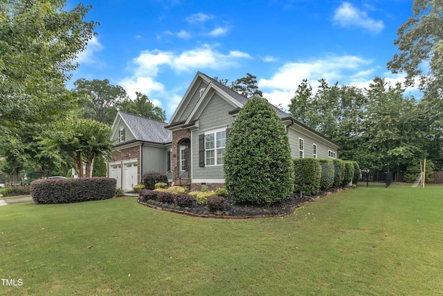 3111 Virginia Pine Ln, Apex, NC 27539 - view of side of home featuring an attached garage and a yard