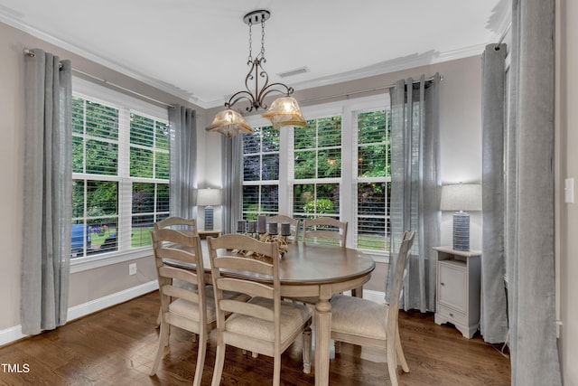 3111 Virginia Pine Ln, Apex, NC 27539 - dining room with plenty of natural light, crown molding, dark wood-style flooring, and a chandelier