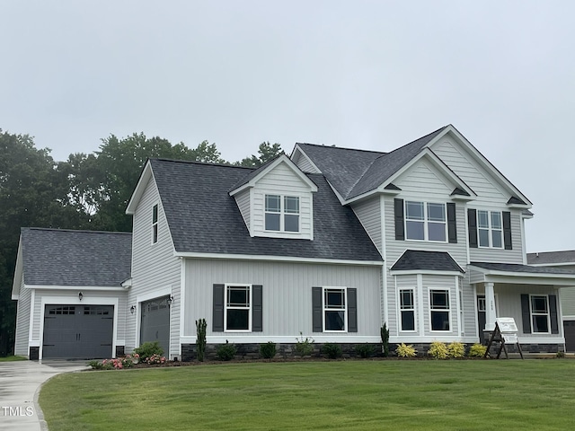 268 Busterfield Ct, Benson, NC 27504 - view of front facade with a front yard, driveway, an attached garage, and a shingled roof