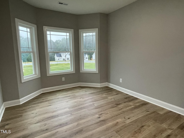268 Busterfield Ct, Benson, NC 27504 - empty room featuring wood finished floors and baseboards