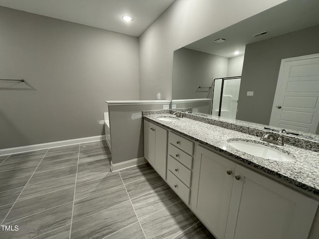 268 Busterfield Ct, Benson, NC 27504 - full bath with double vanity, baseboards, a bath, a shower with shower door, and recessed lighting
