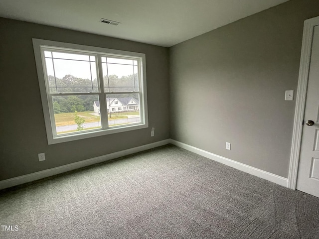268 Busterfield Ct, Benson, NC 27504 - carpeted spare room featuring baseboards