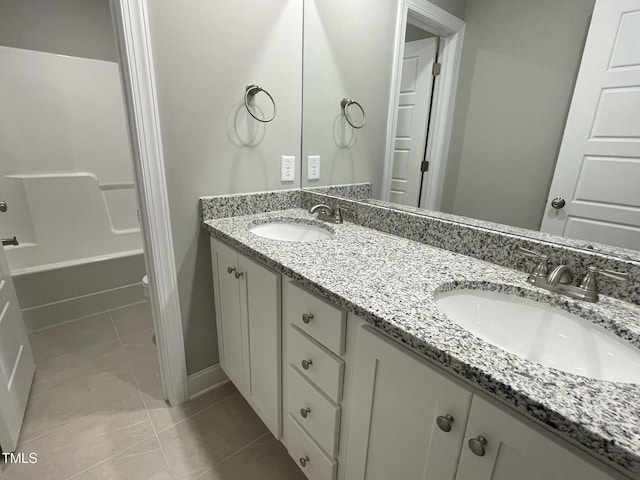 268 Busterfield Ct, Benson, NC 27504 - bathroom featuring double vanity, tile patterned floors, shower / tub combination, and toilet