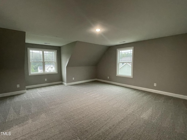268 Busterfield Ct, Benson, NC 27504 - bonus room with baseboards, carpet, plenty of natural light, and lofted ceiling