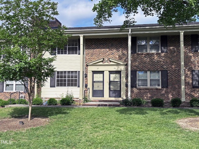 1002 Willow Dr Unit 37, Chapel Hill, NC 27514 - view of front of property featuring a front yard and brick siding