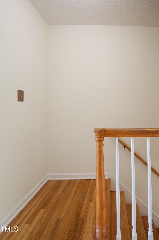 1002 Willow Dr Unit 37, Chapel Hill, NC 27514 - stairs featuring wood finished floors and baseboards
