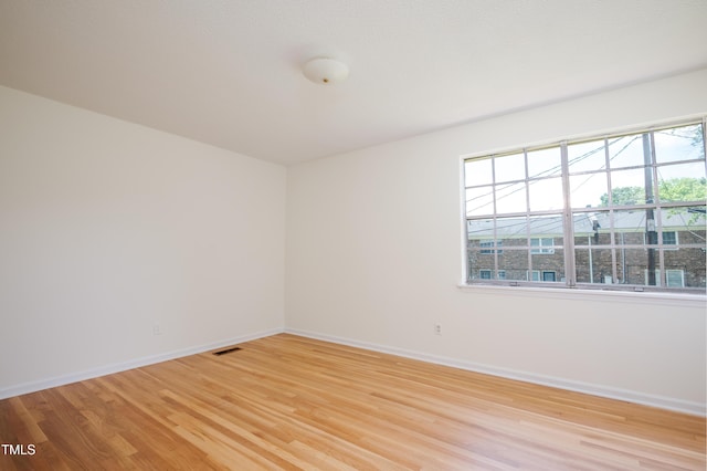 1002 Willow Dr Unit 37, Chapel Hill, NC 27514 - spare room with light wood finished floors, healthy amount of natural light, and baseboards