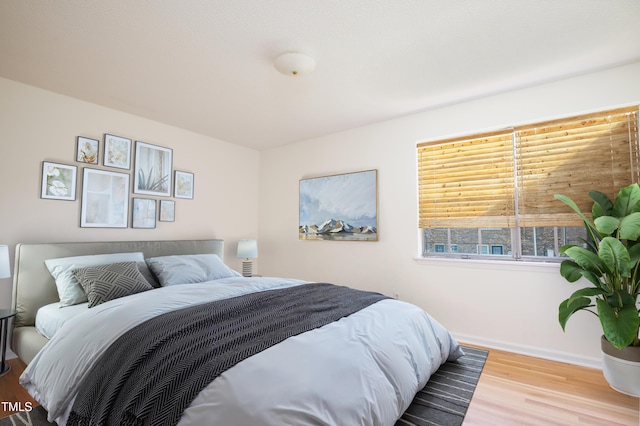 1002 Willow Dr Unit 37, Chapel Hill, NC 27514 - bedroom featuring wood finished floors and baseboards