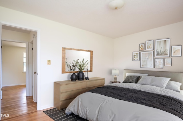 1002 Willow Dr Unit 37, Chapel Hill, NC 27514 - bedroom featuring light wood-style flooring and baseboards