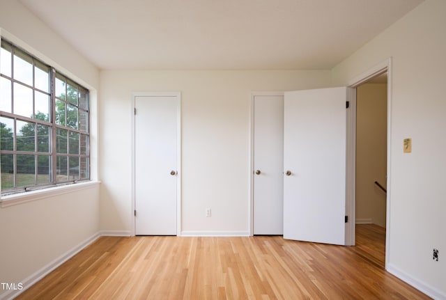 1002 Willow Dr Unit 37, Chapel Hill, NC 27514 - unfurnished bedroom with light wood-type flooring and baseboards