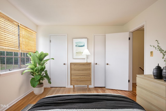 1002 Willow Dr Unit 37, Chapel Hill, NC 27514 - bedroom with wood finished floors and baseboards