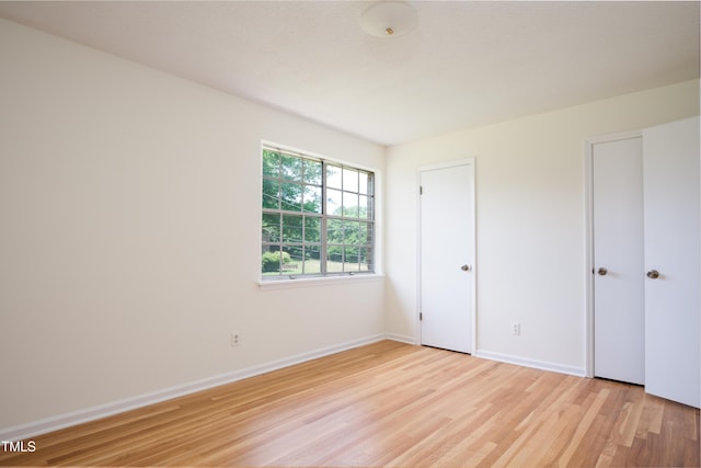 1002 Willow Dr Unit 37, Chapel Hill, NC 27514 - unfurnished bedroom featuring light wood-style floors and baseboards
