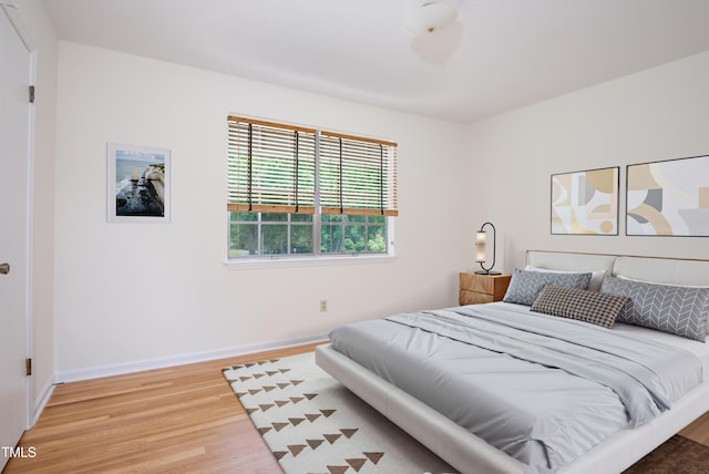 1002 Willow Dr Unit 37, Chapel Hill, NC 27514 - bedroom with light wood-style flooring and baseboards