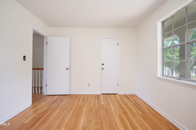 1002 Willow Dr Unit 37, Chapel Hill, NC 27514 - empty room featuring light wood-style floors and baseboards