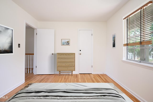 1002 Willow Dr Unit 37, Chapel Hill, NC 27514 - bedroom featuring light wood-style flooring and baseboards